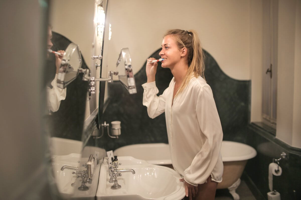 Woman Brushing Her Teeth