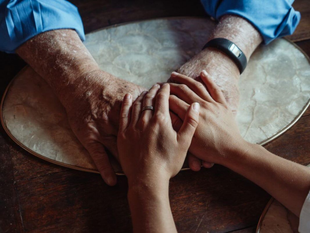 Picture Of Young And Elderly Hands