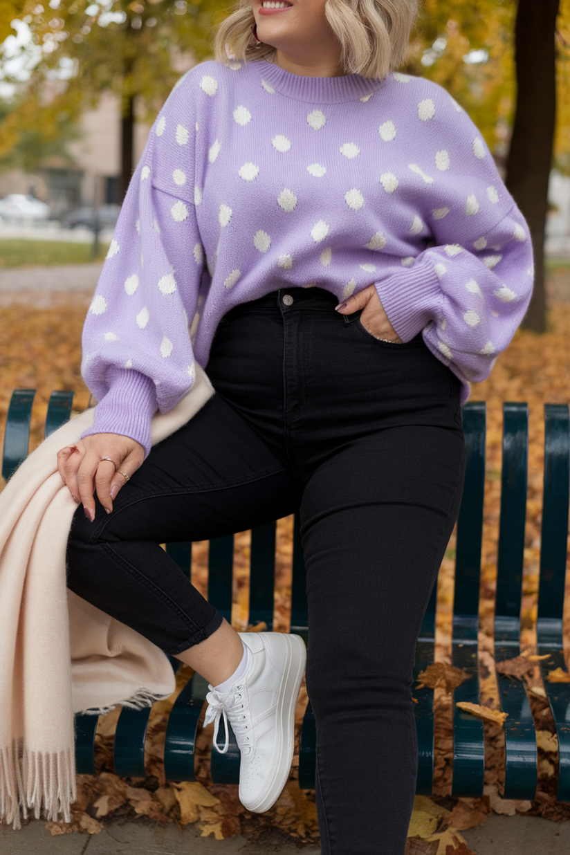 A plus-size soft girl outfit with a lavender polka-dot sweater, black jeans, and white sneakers, styled for a casual and cozy look.